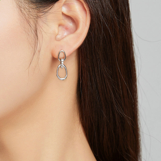 Boucles d'oreilles géométriques en argent S925 avec cristal blanc